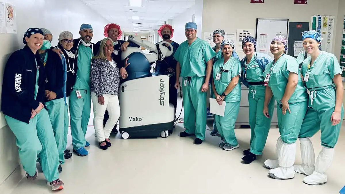 Dr. Avino and surgical team celebrating 500th Mako robotic procedure