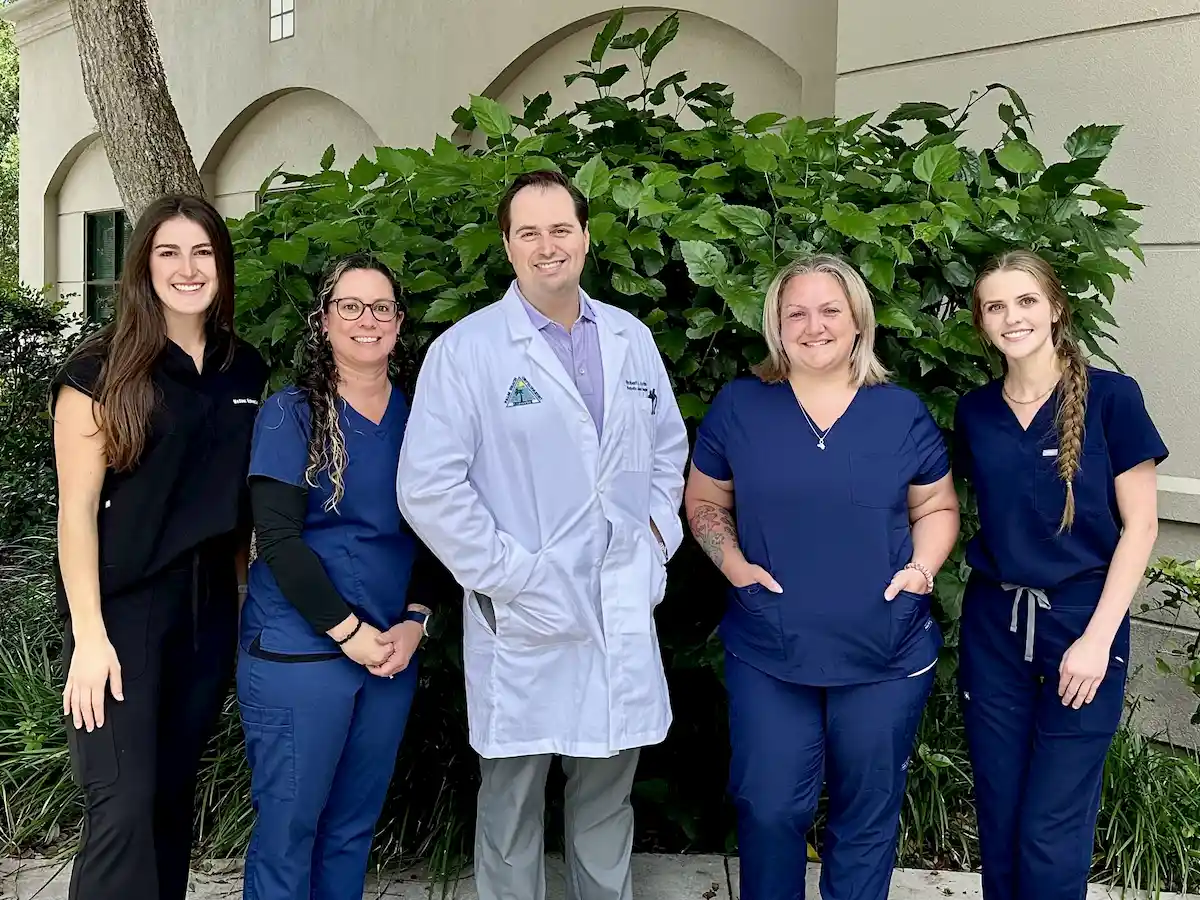 Dr. Avino with his care team in Palm Beach County